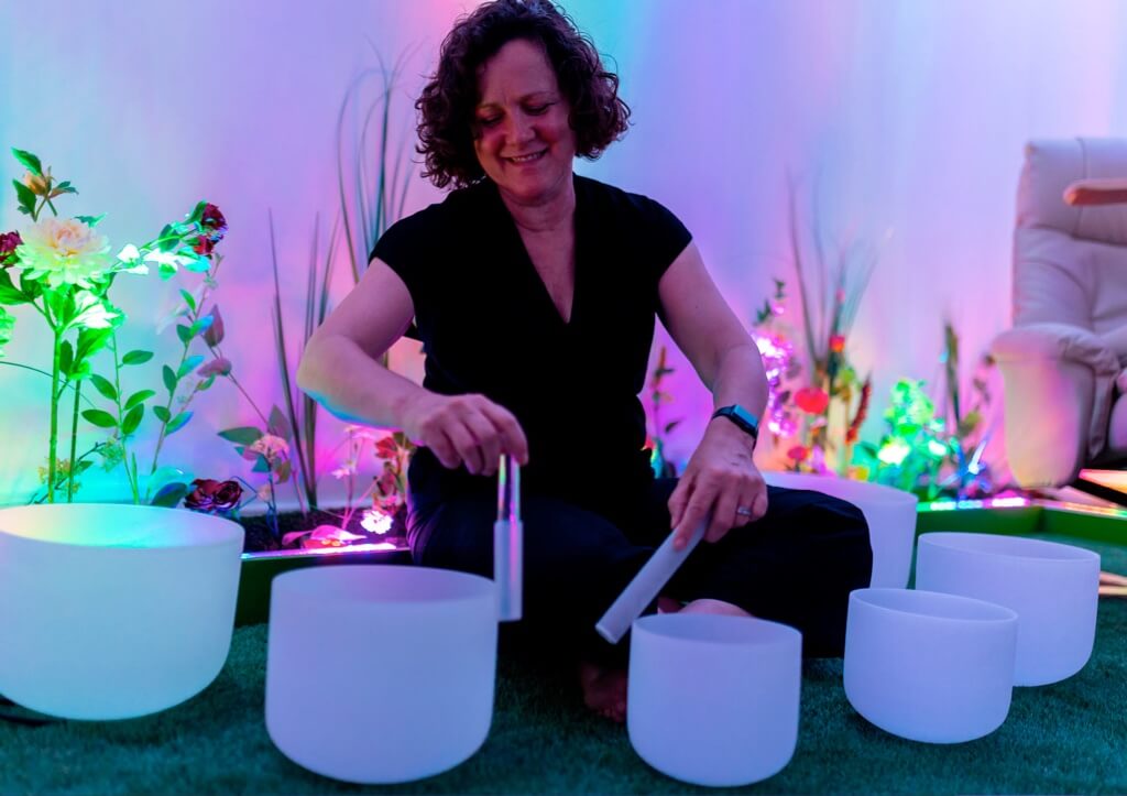 A lady leading a sound bath, in Bath!