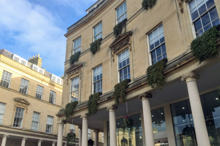 The front of the Thermae Bath Spa with it’s honey-coloured stonework